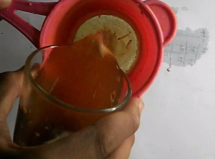 Insert the Traditional Medicine Into Empty Glass and Stir Well