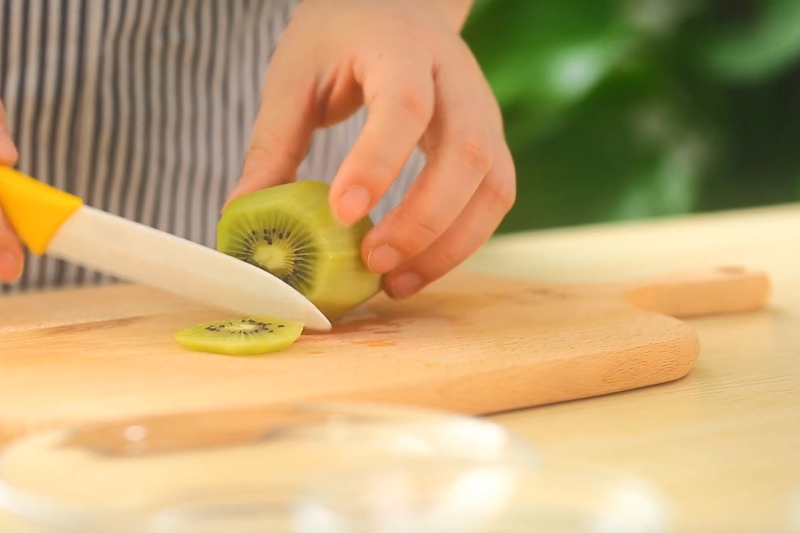 Prepping Kiwifruit Slices and Mango Cubes
