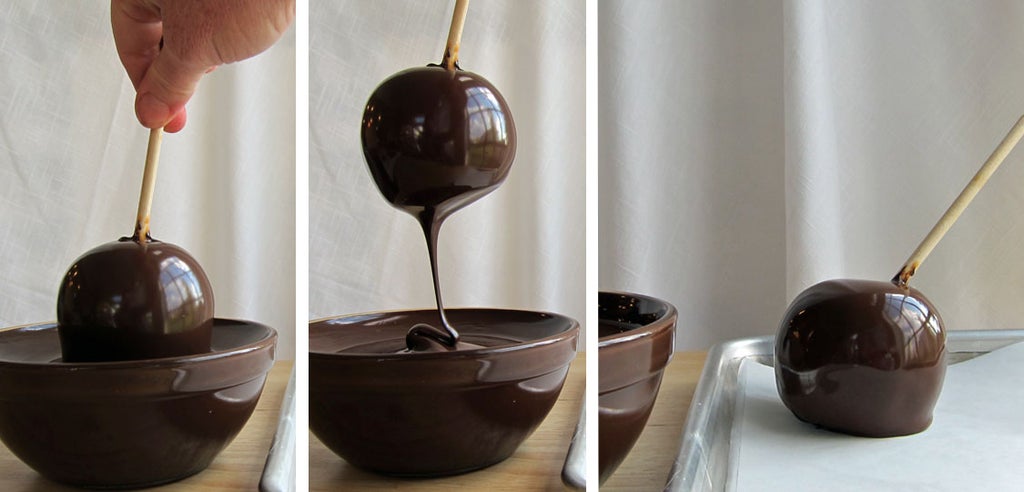 Dipping Caramel Apples in Chocolate