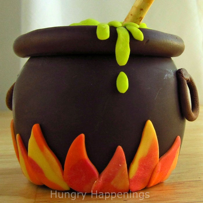 Finish the Cauldron by Adding Drips of Bubbling Brew.