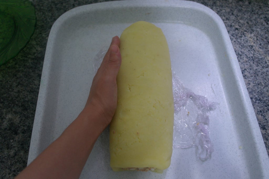 轻柔整理卷型使其圆润