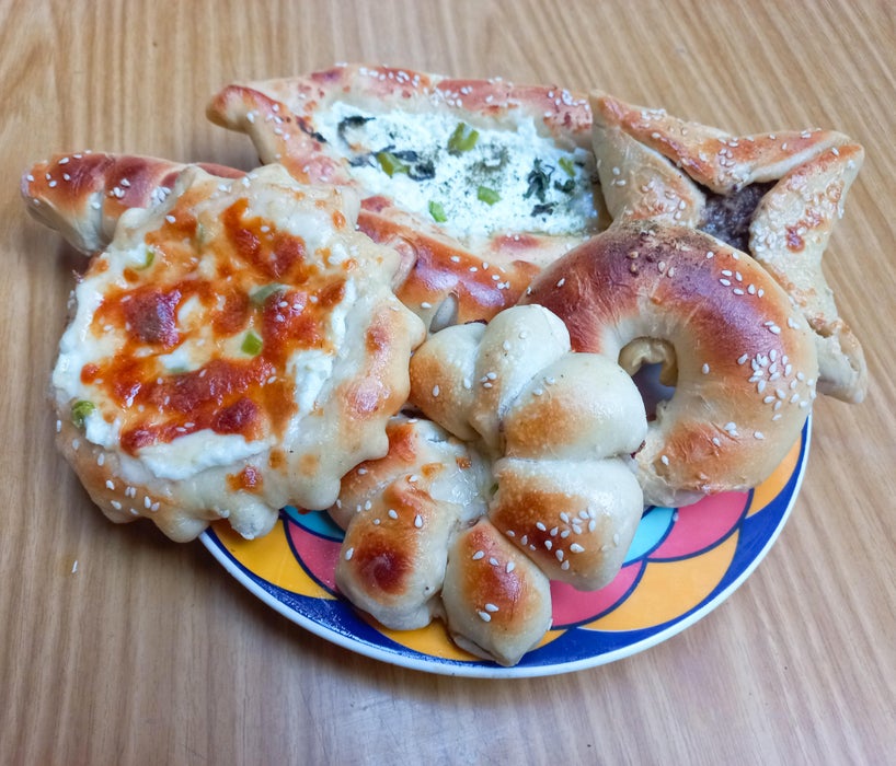 乳清面包搭配酸奶酪的创意造型(灵感源自Manakish)